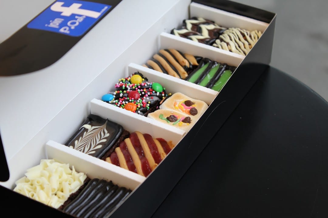 A box of assorted P.Osh brownies