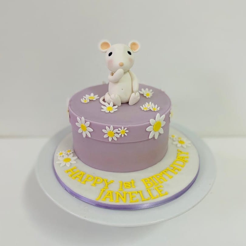 Susucre first birthday cake with a fondant mouse topper