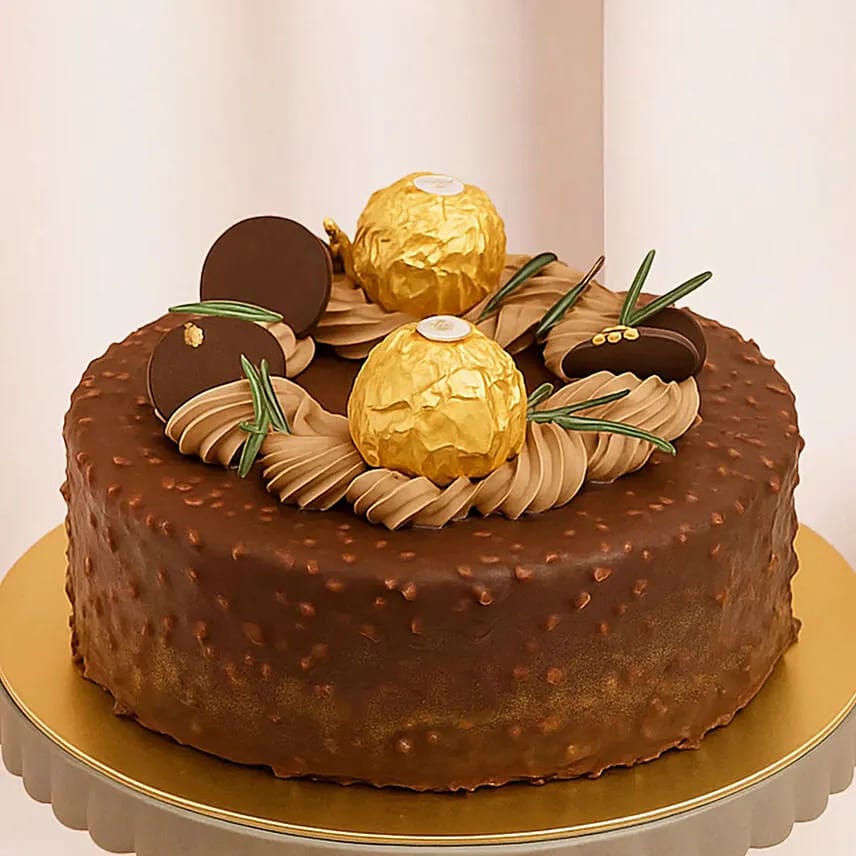 Ferns N Petals chocolate hazelnut cake with gold-wrapped chocolates