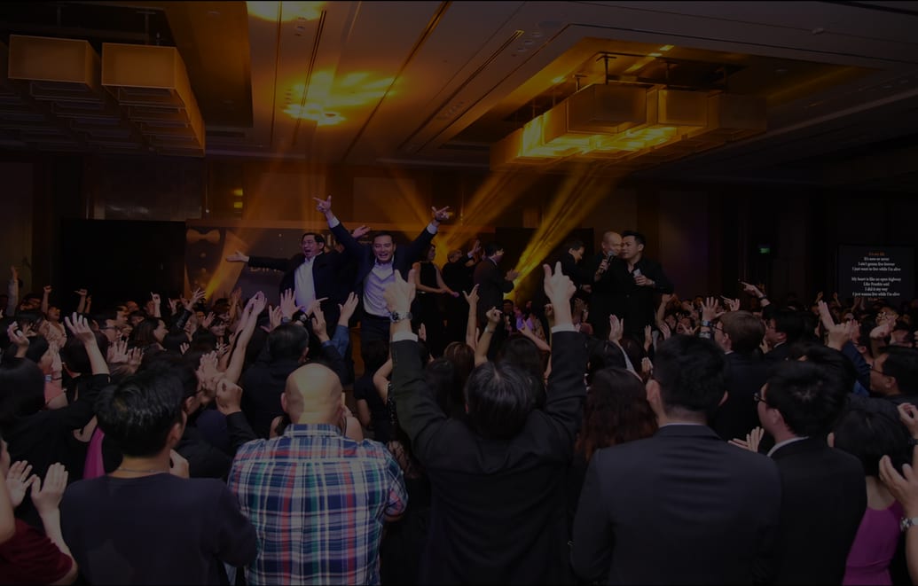 Guests on the dance floor at a Se7en Friday corporate event